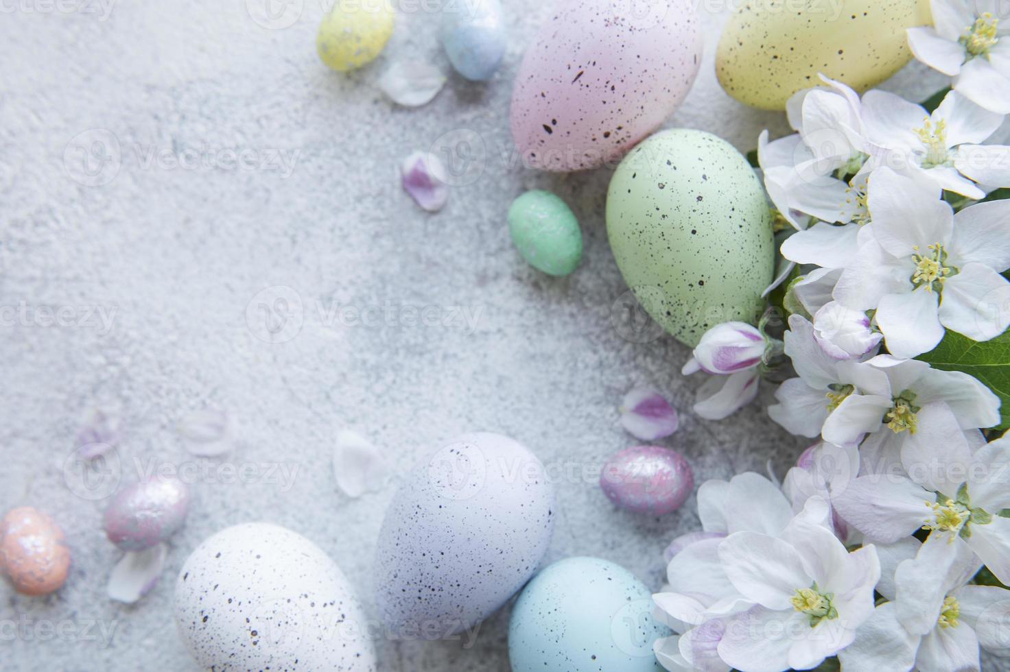 Colorful Easter eggs on concrete background photo