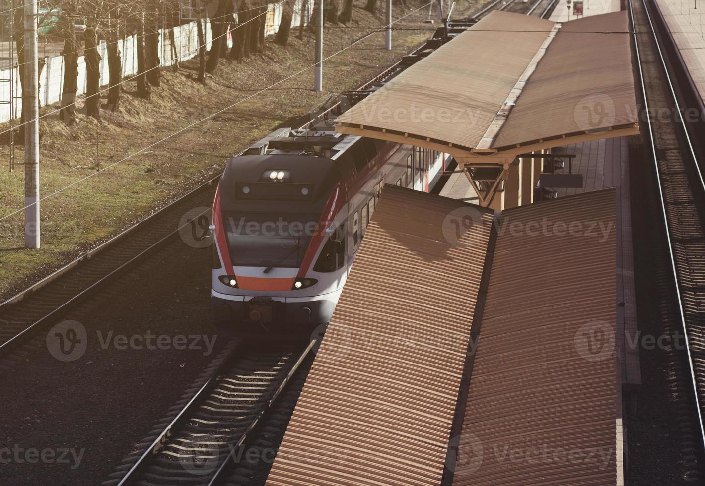 railway station with commuter train photo