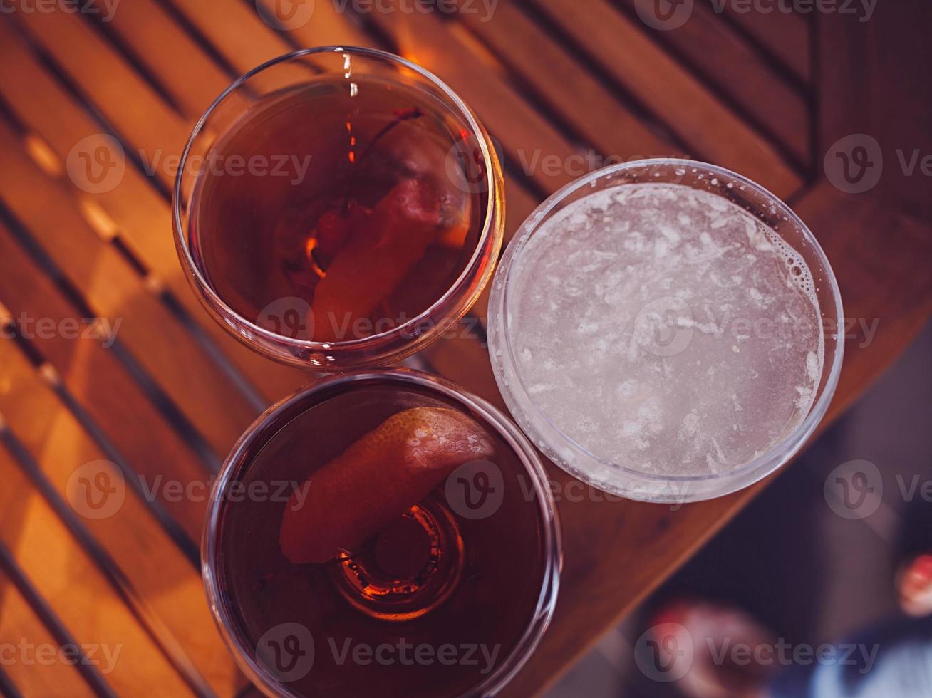 three alcoholic cocktails photo