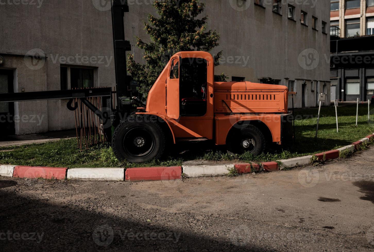 retro loader near the warehouse photo