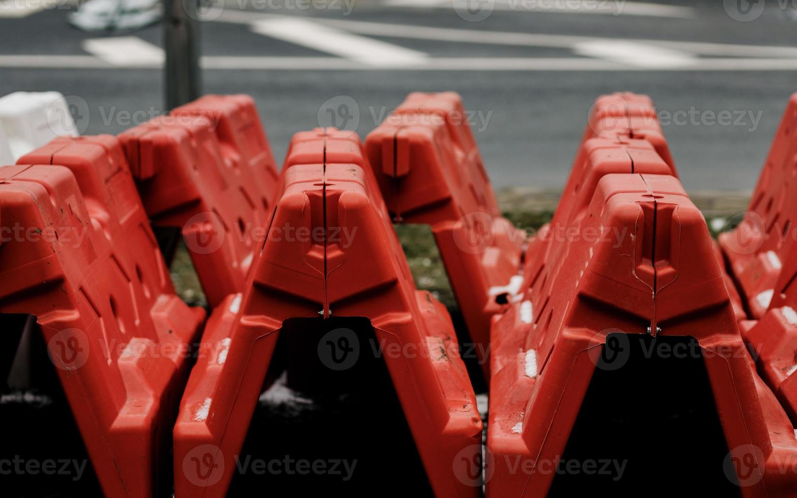 Red plastic road barriers photo