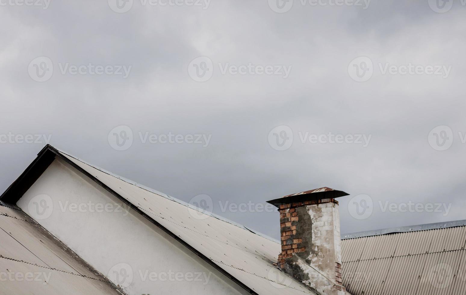 old house with a chimney photo