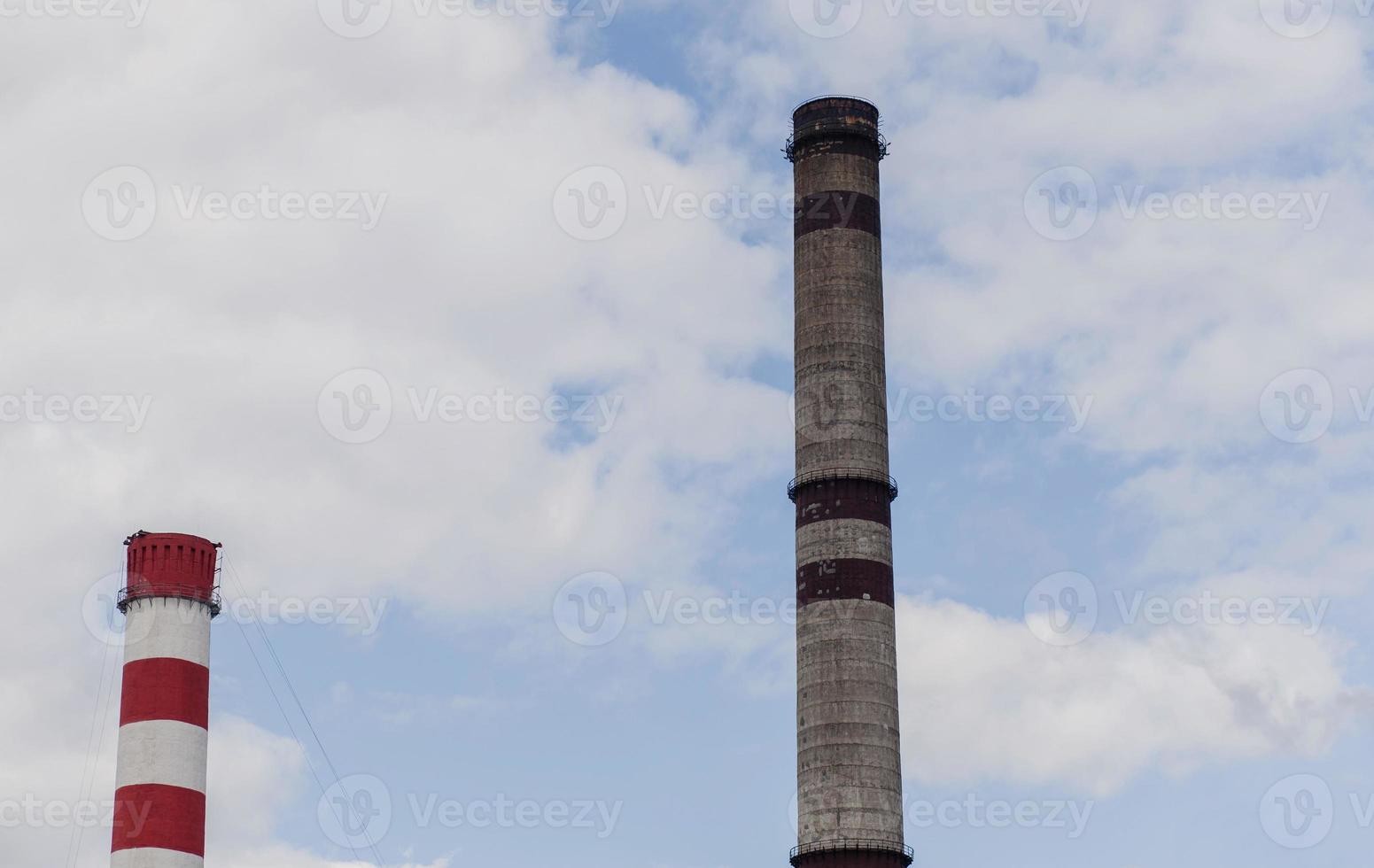 industrial pipes against the sky photo