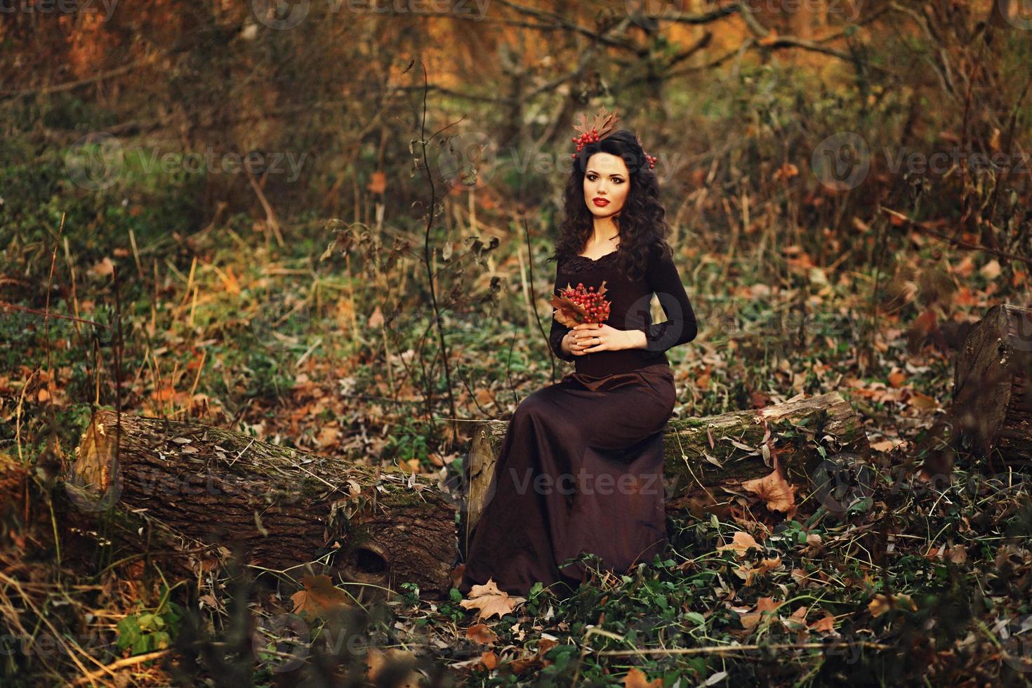 mysterious lady in forest photo