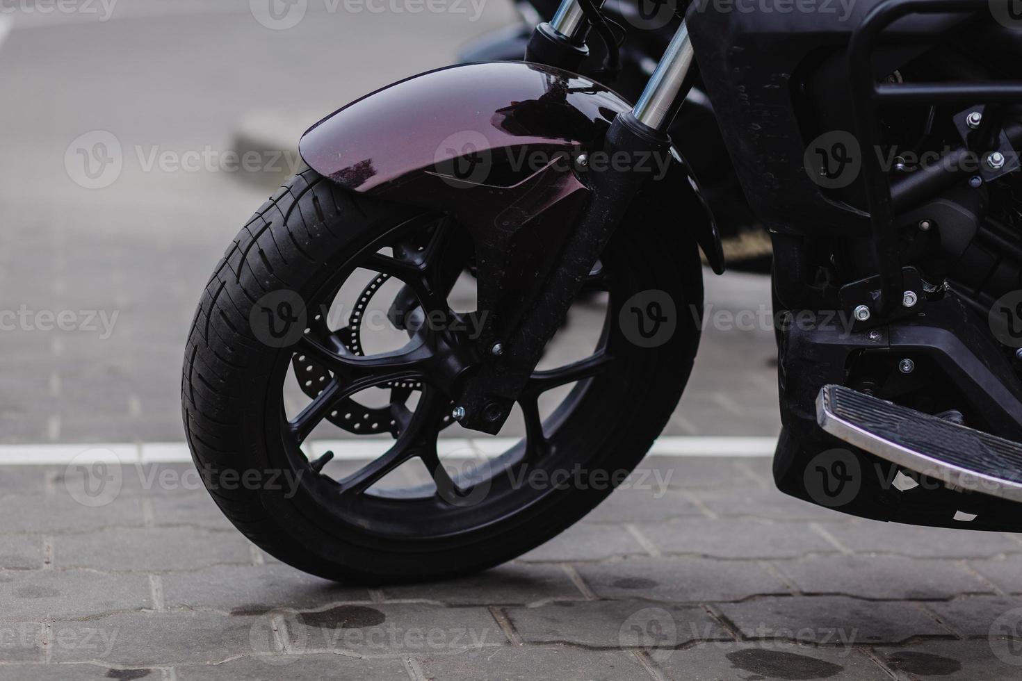 black wheel of a sports motorcycle photo