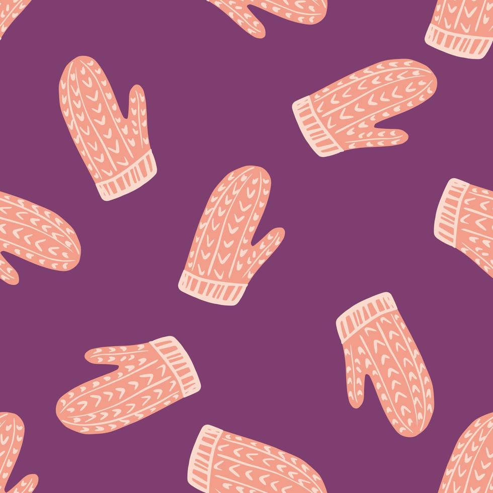 Random pink doodle mittens seamless pattern in cozy style. Purple background. Clothes winter print. vector