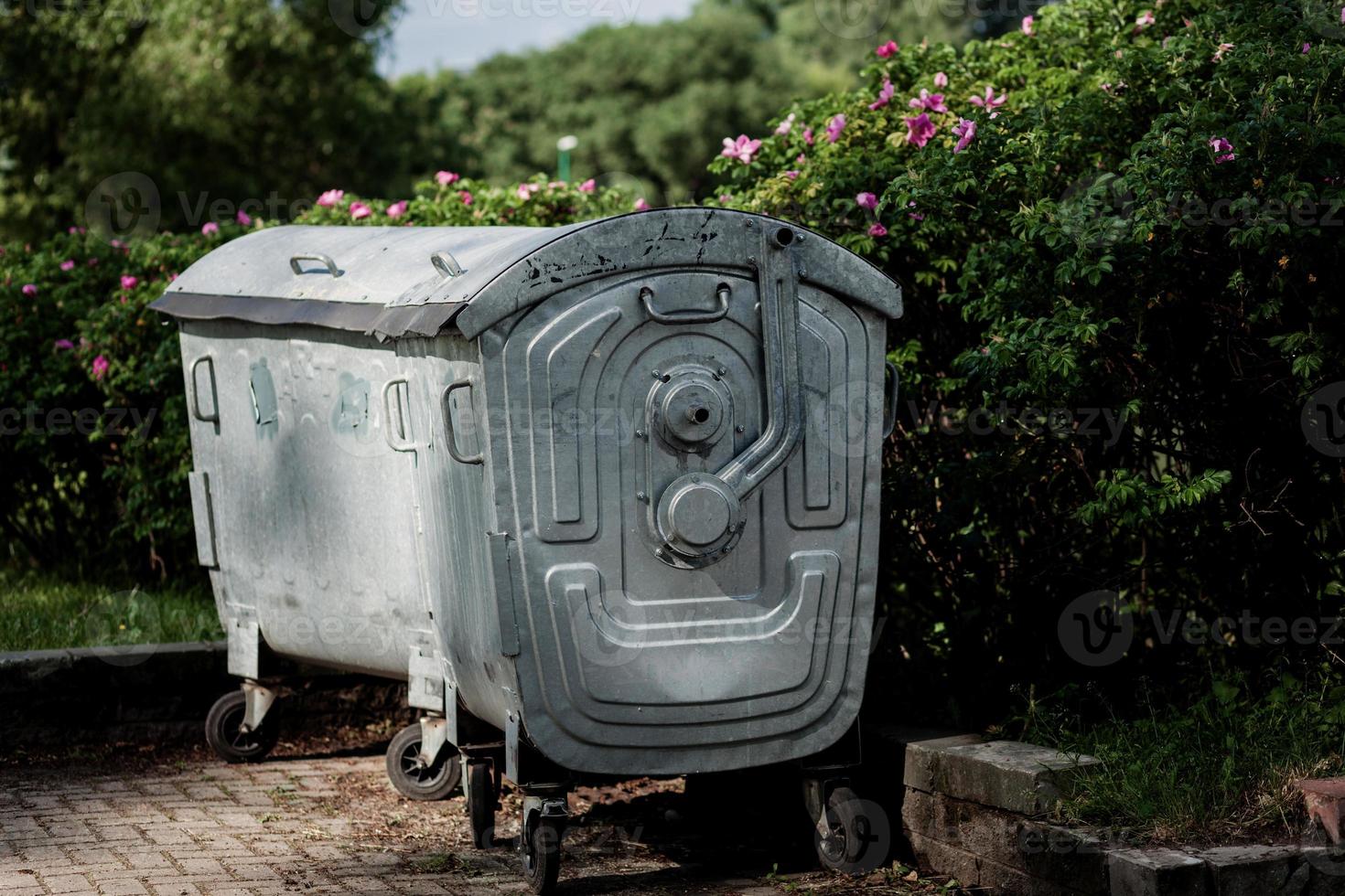 Metallic garbage container photo