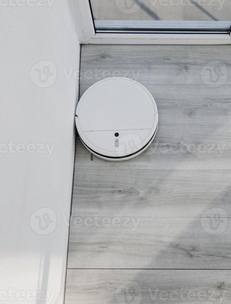 Top view of a robot vacuum cleaner photo