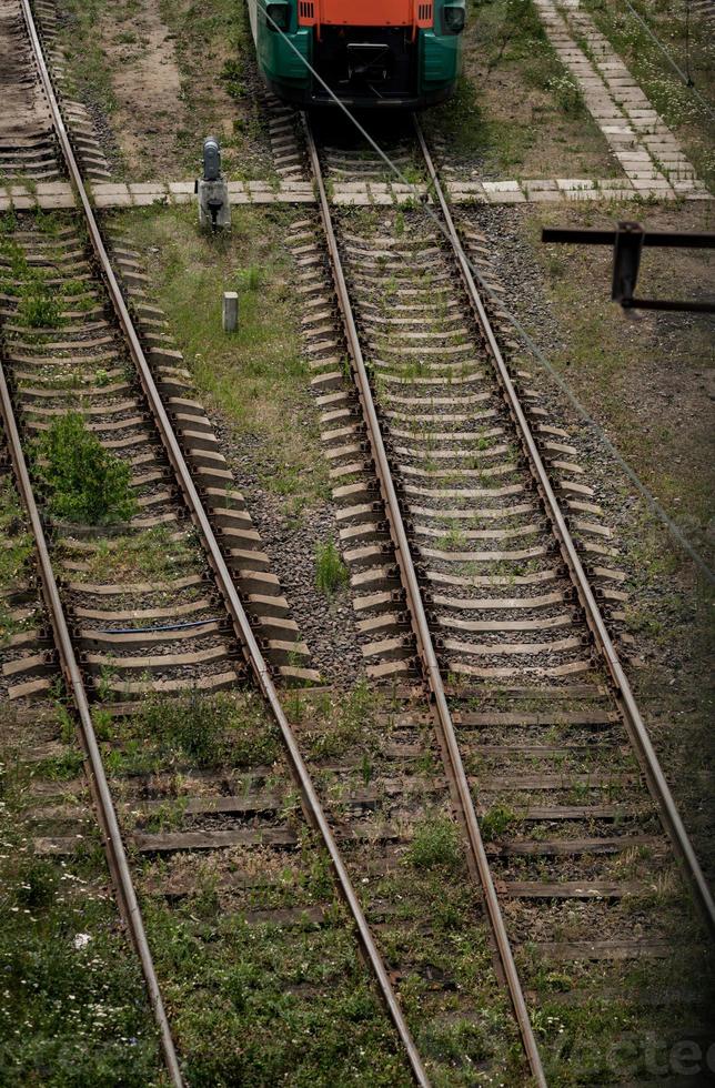 train passes through the railway tracks. photo