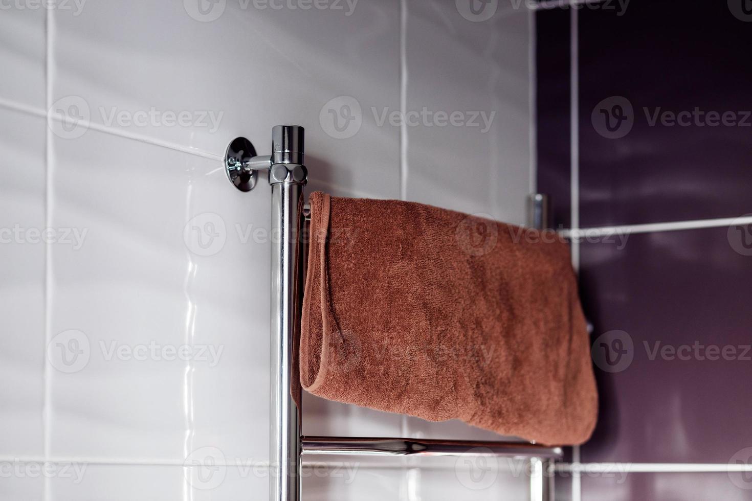 towel hangs in the bathroom photo