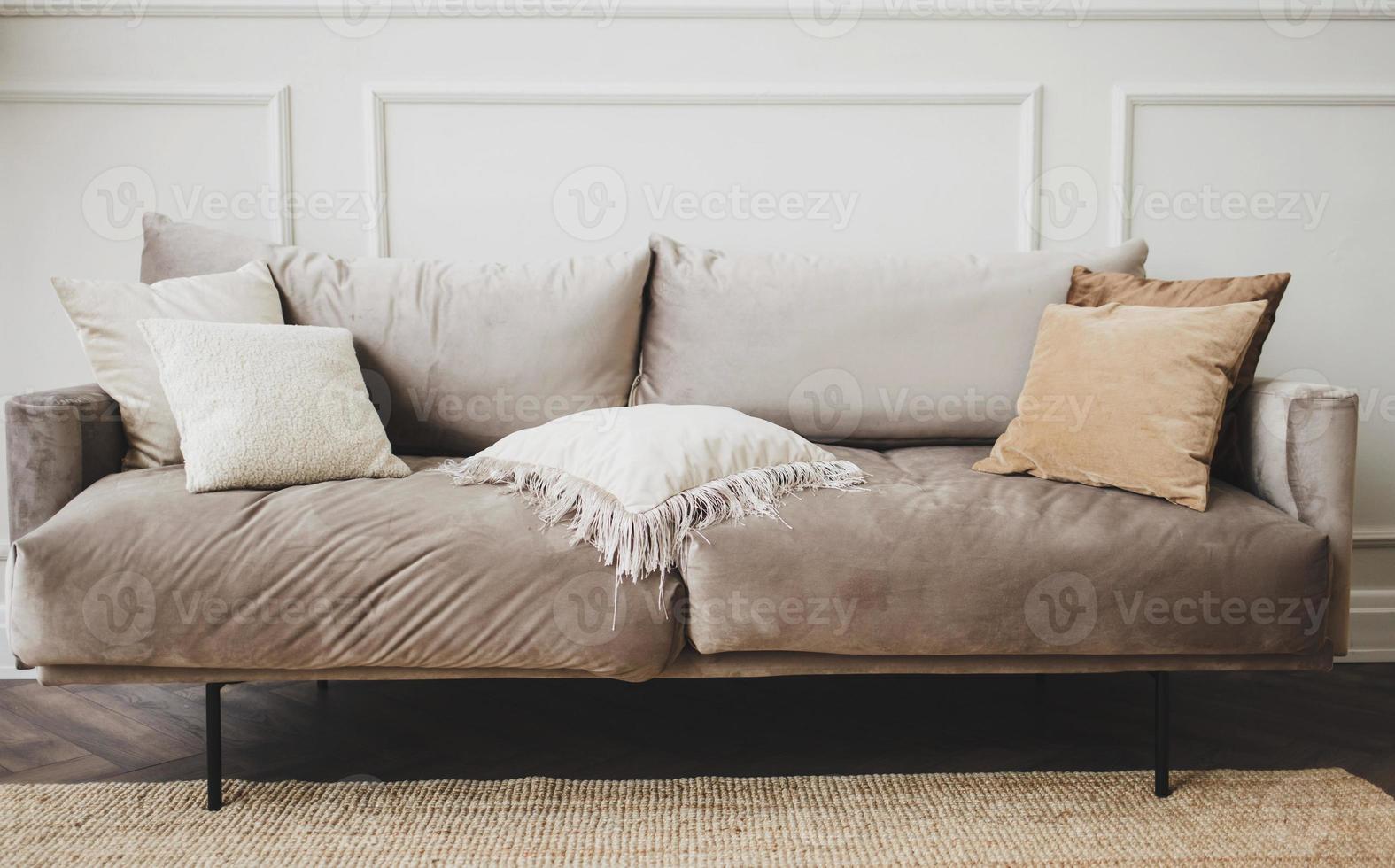 gray sofa with pillows 5704901 Stock Photo at Vecteezy