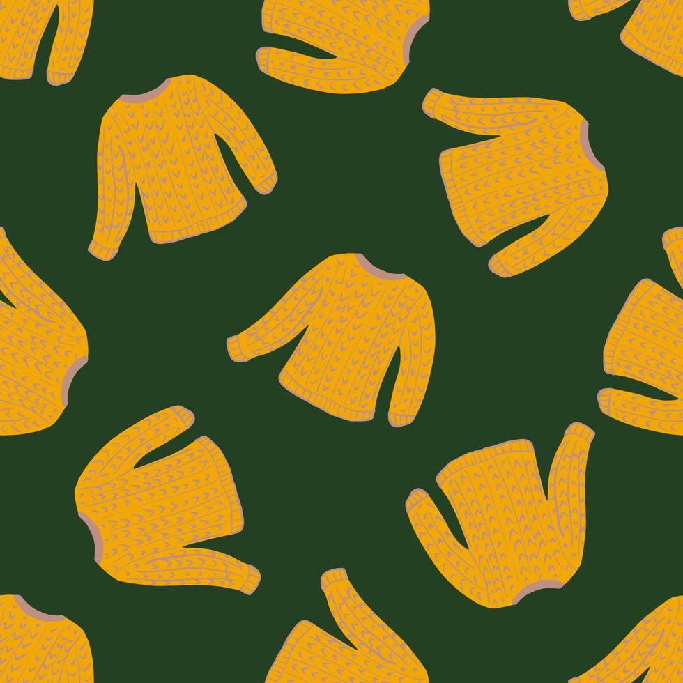 Simple seamless fashion pattern wih bright orange sweater print on green background. vector