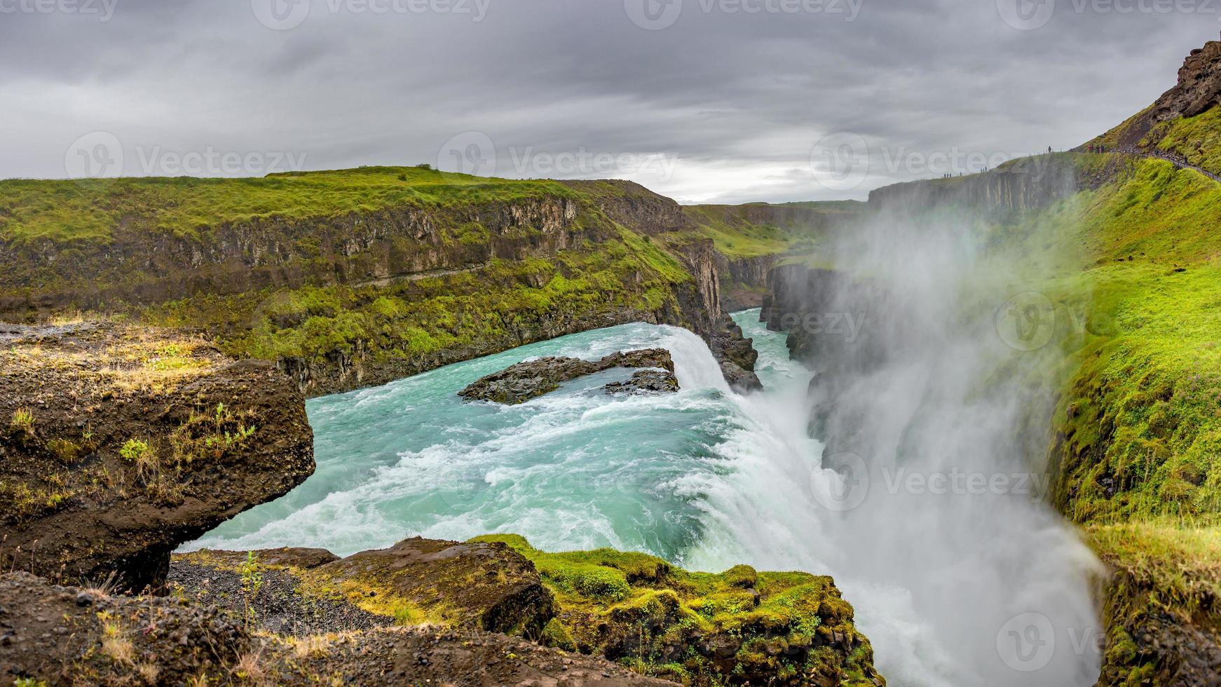 Panoramic view over waterfall wonder Gullfoss in South Iceland, Golden Circle, at summer with dramatic sky. photo