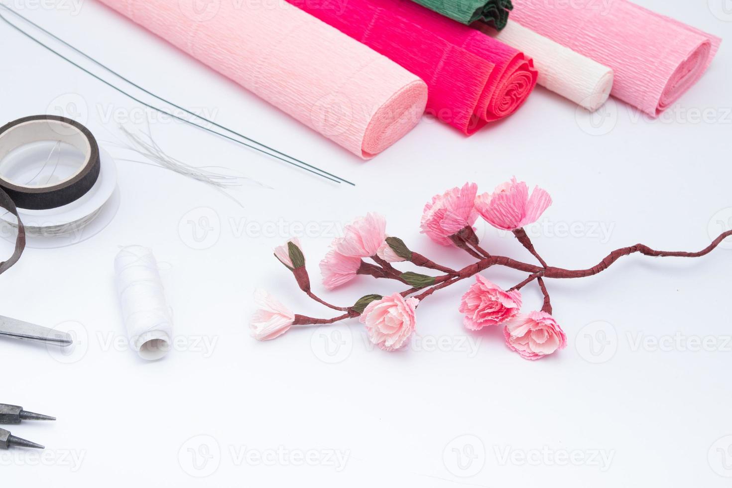 Tools and materials for creating a spring branch with sakura flowers from corrugated paper. Do it yourself photo