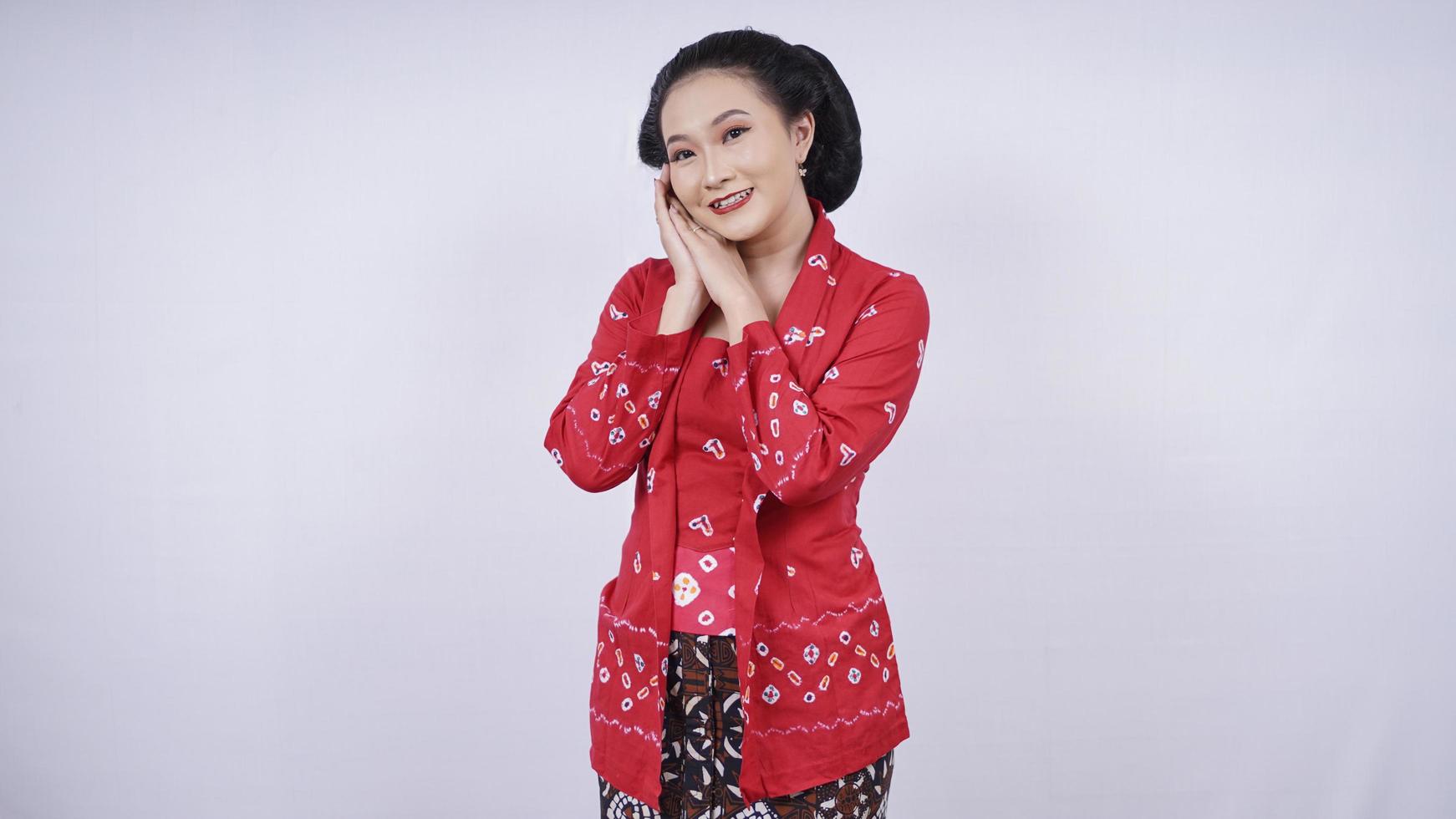 beautiful asian in kebaya posing spoiled isolated on white background photo