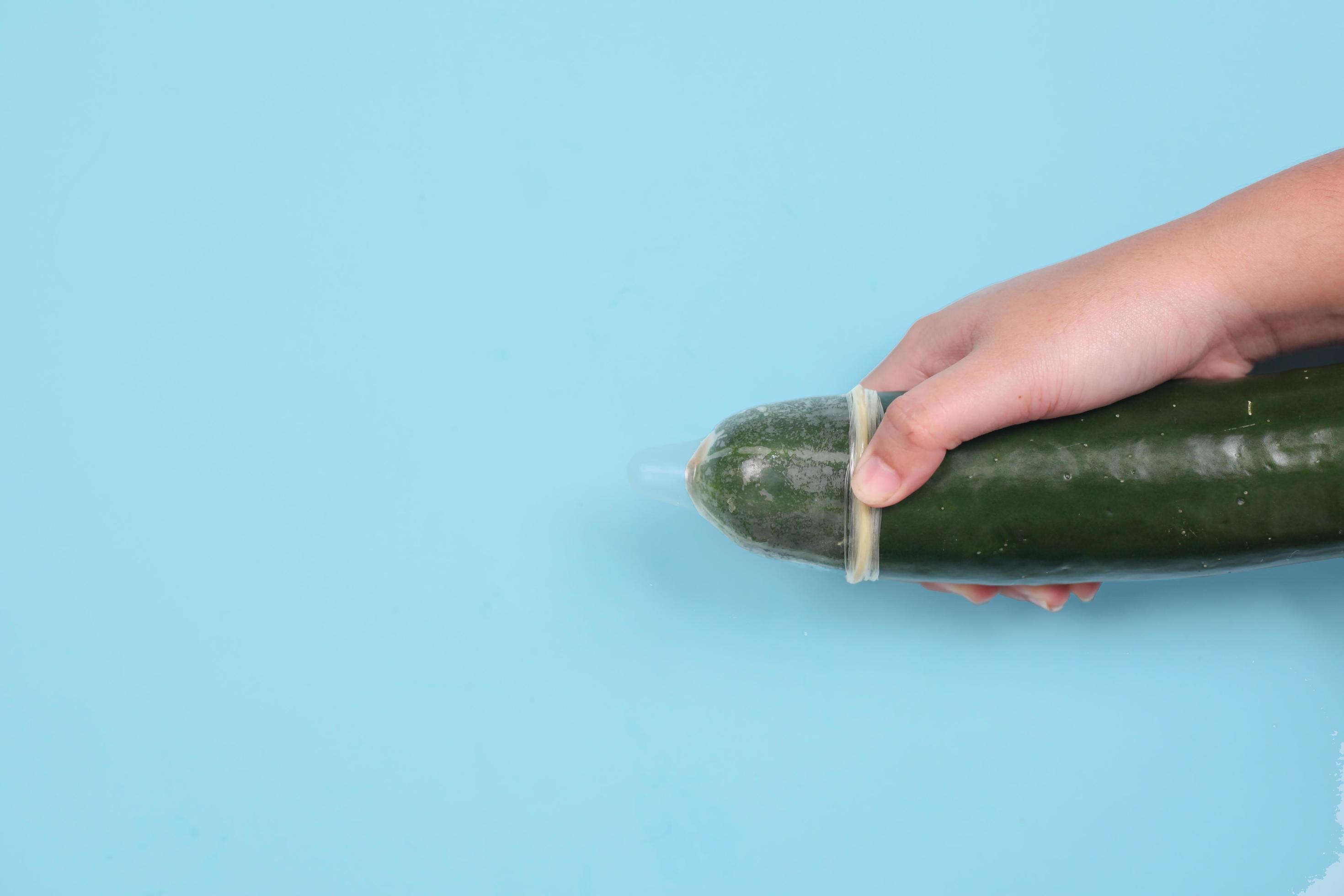 sex education with cucumber and contraception isolated on blue background 5714382 Stock Photo at Vecteezy pic