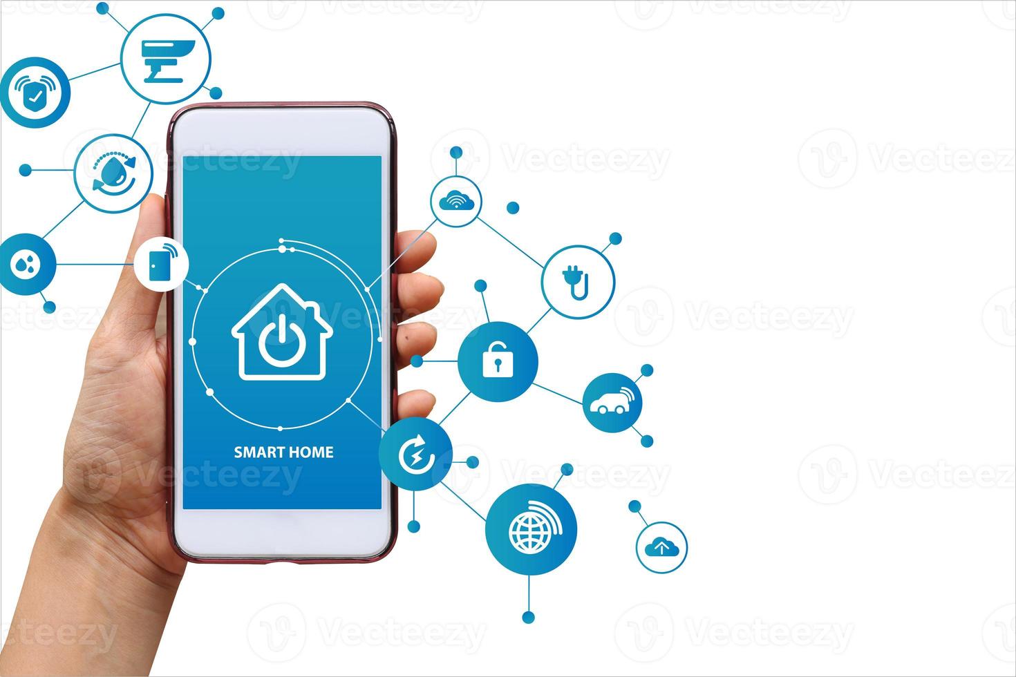 Hand of woman or man holding smartphone in house with icons, lifestyle of person in modern life internet of things, smart home technology. concept of automation. the new innovation of the future photo
