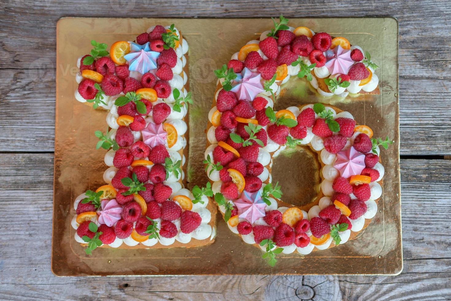 homemade cake in the form of the number sixteen photo