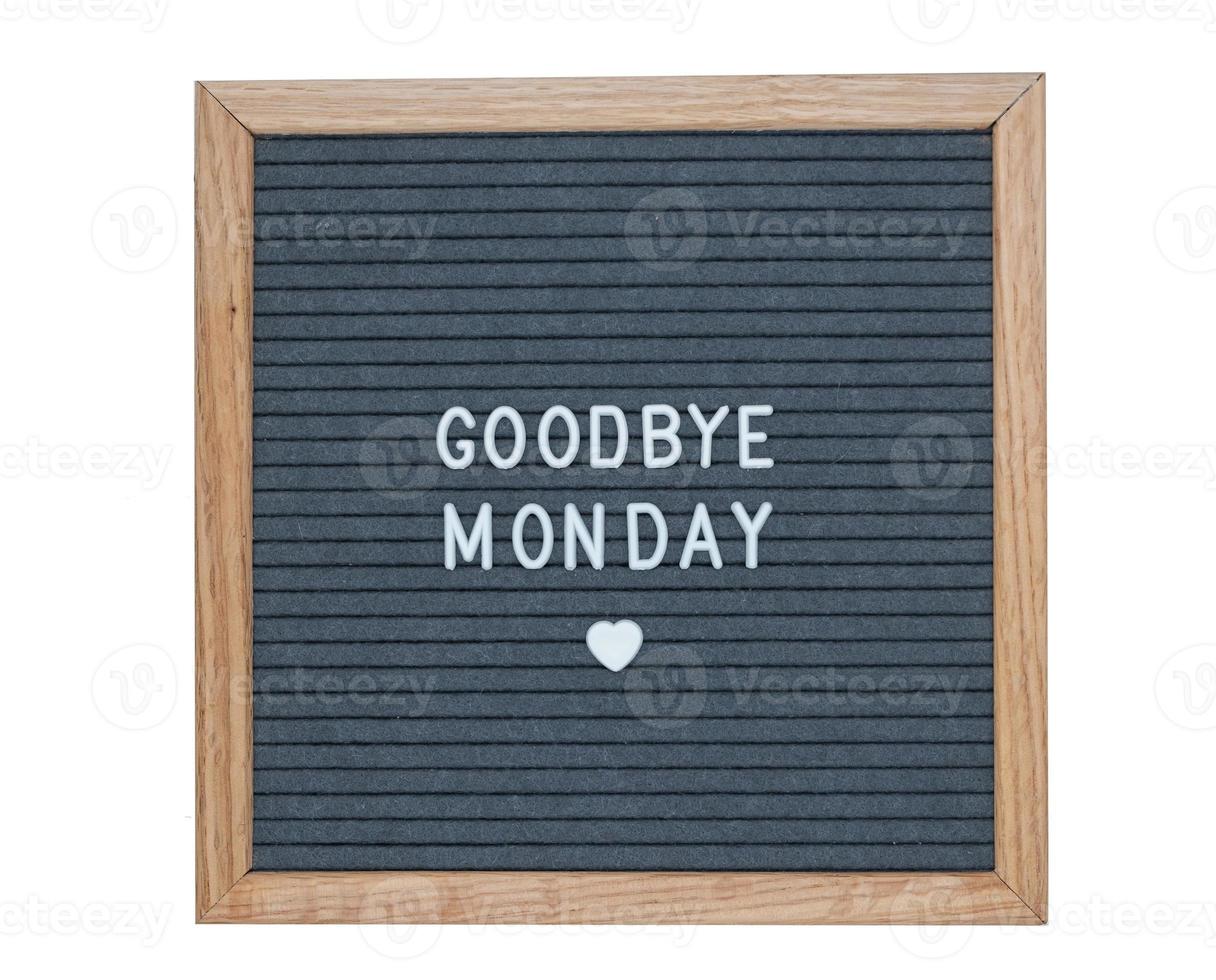 text in English goodbye Monday on a felt letter Board in gray photo