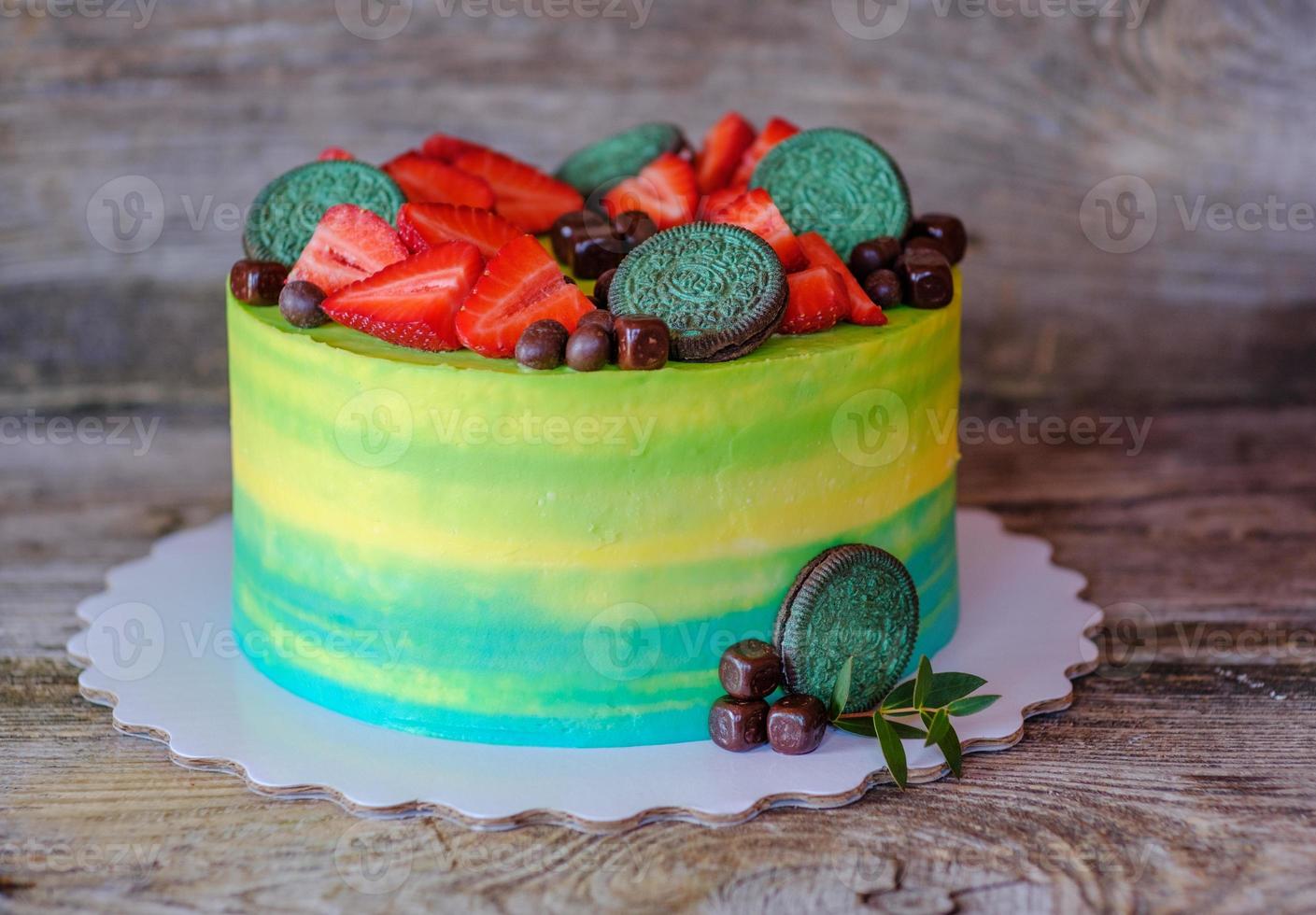 beautiful homemade cake with yellow and green cream photo