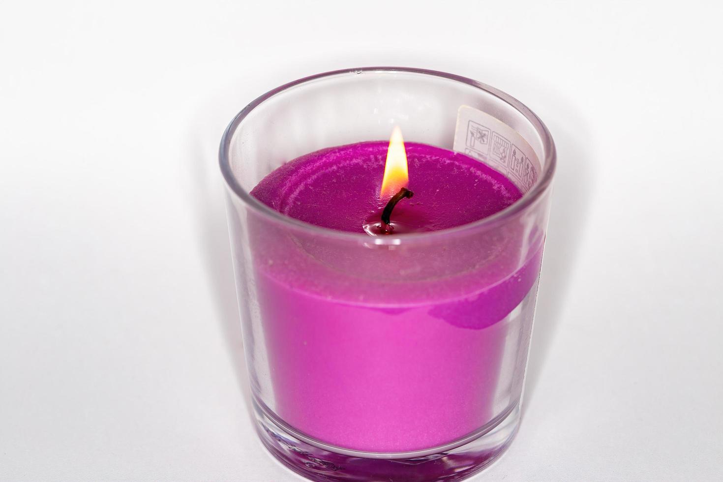 New Year's candle on a white background photo