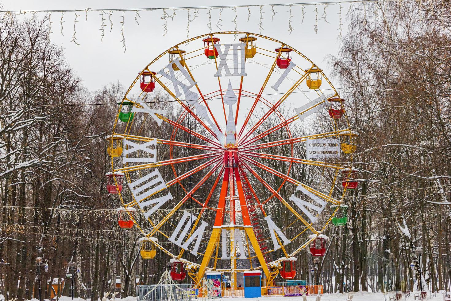 Ferris wheel in the form of a New Year's clock photo