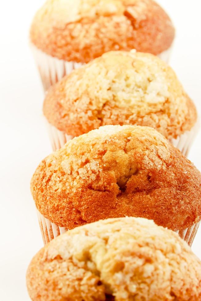 Homemade muffins on a white background. Vertical image. photo