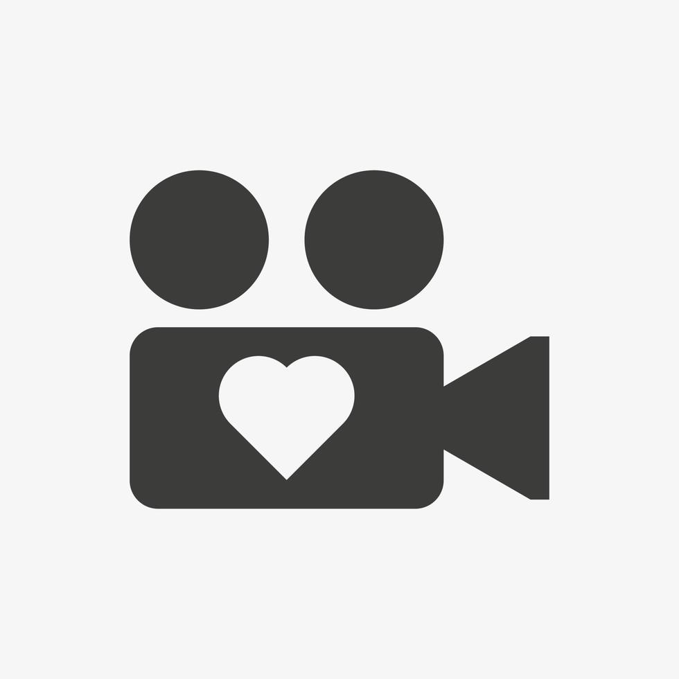 Video camera with heart vector icon isolated on white background. Love camera symbol