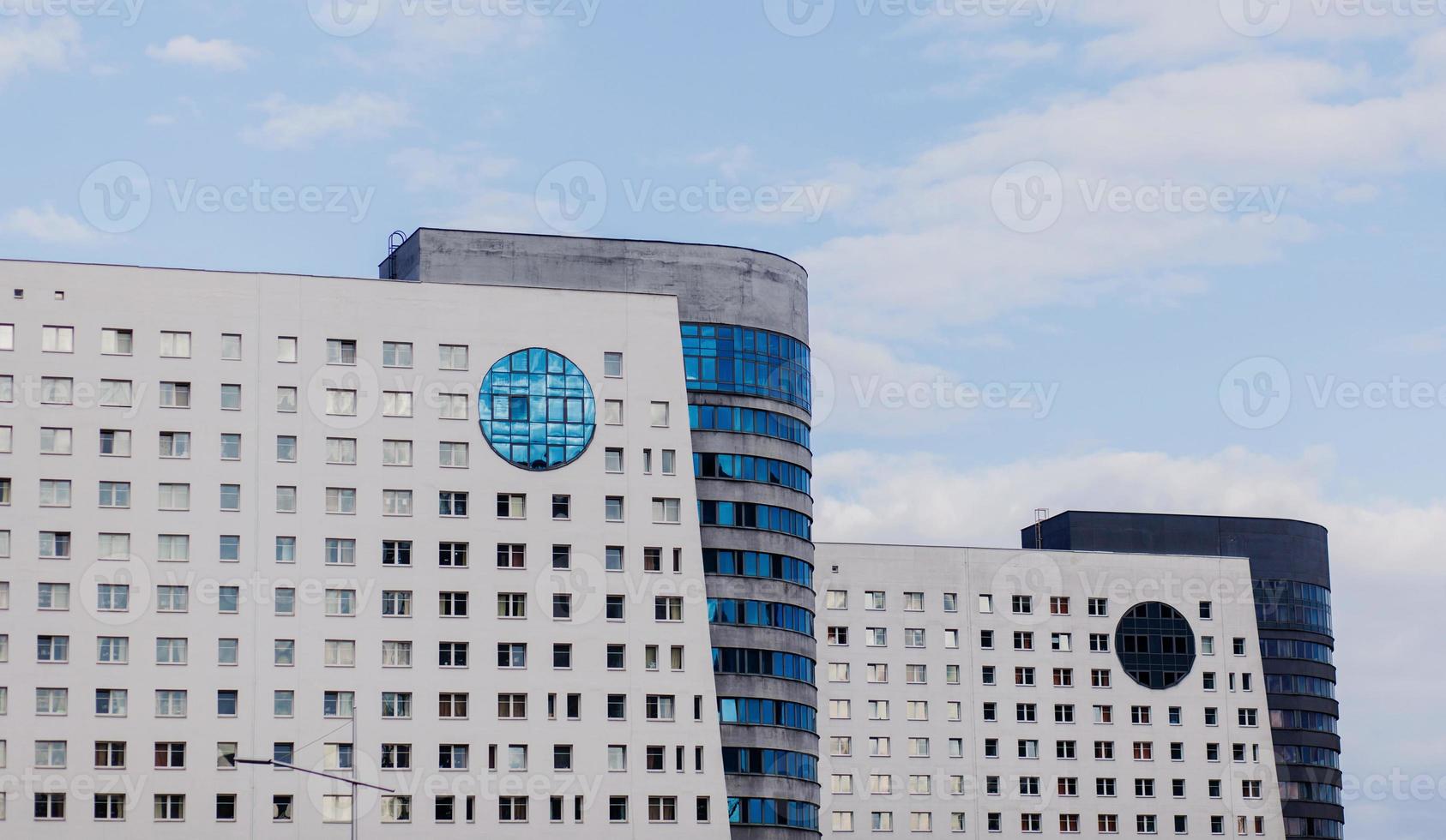 Apartment building against the sky photo