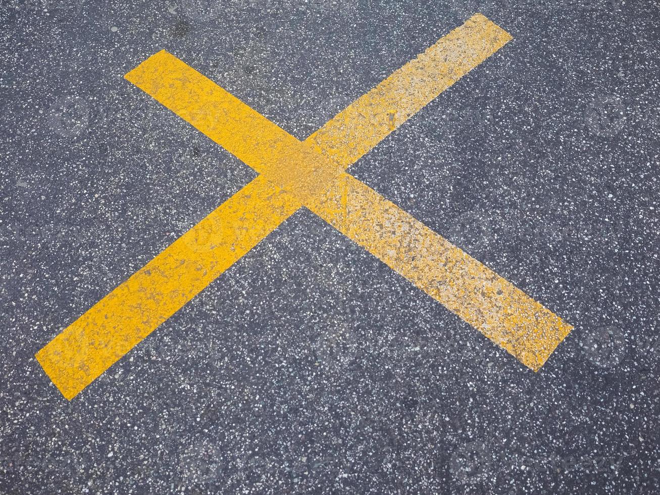 Yellow X sign photo