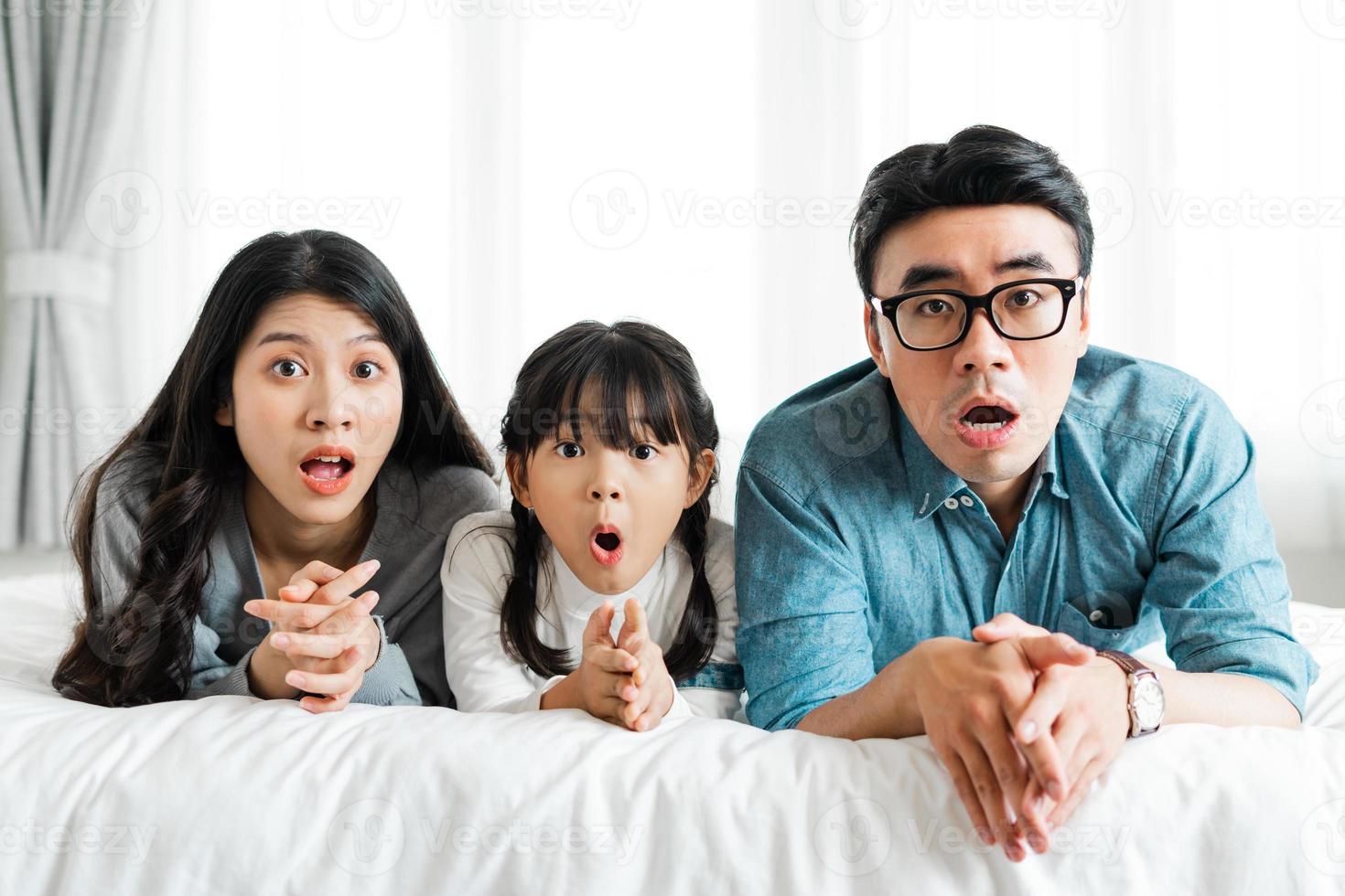 small asian family portrait at home photo