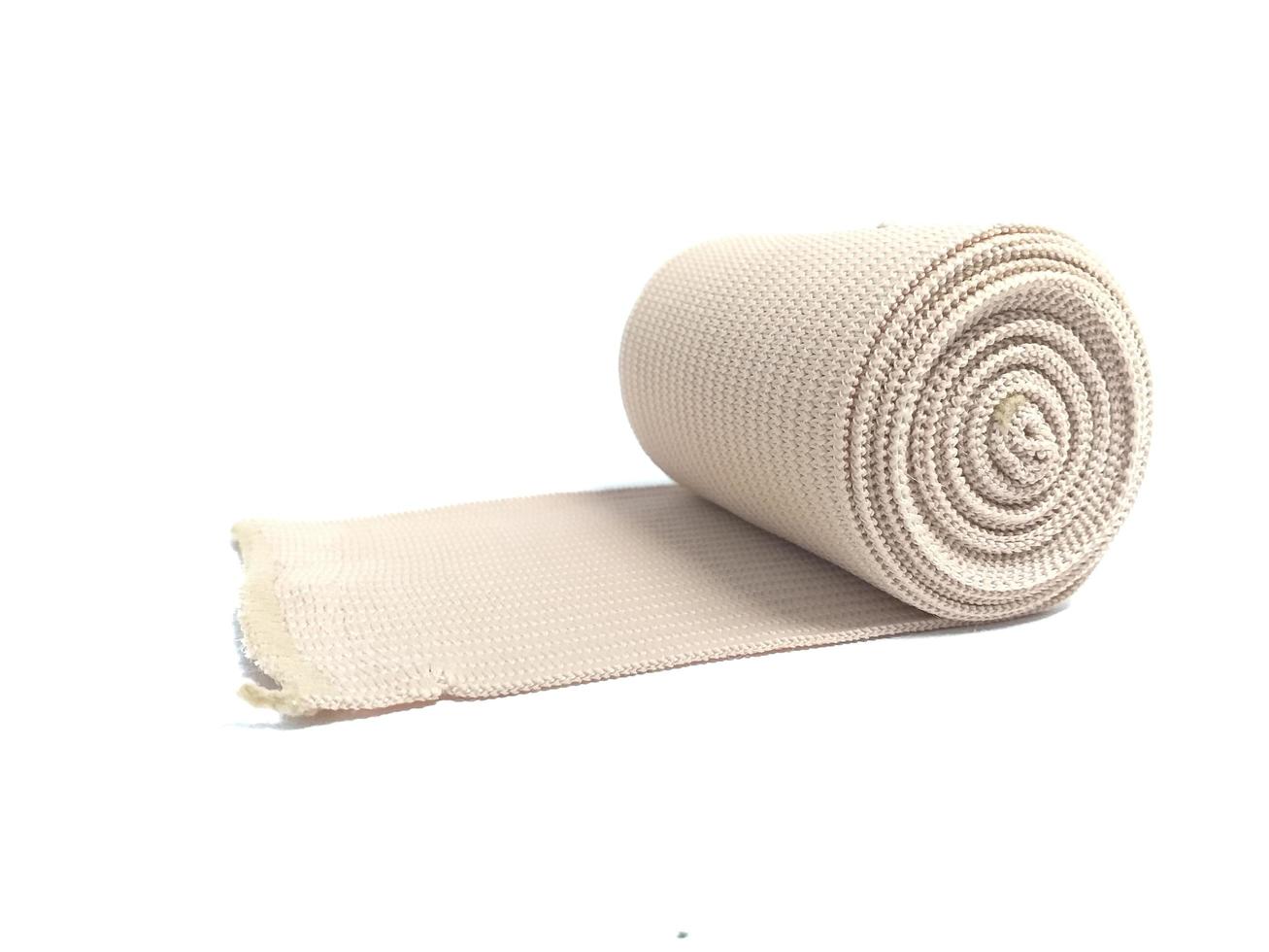 Medical Elastic bandage roll for first aid isolated on white background photo