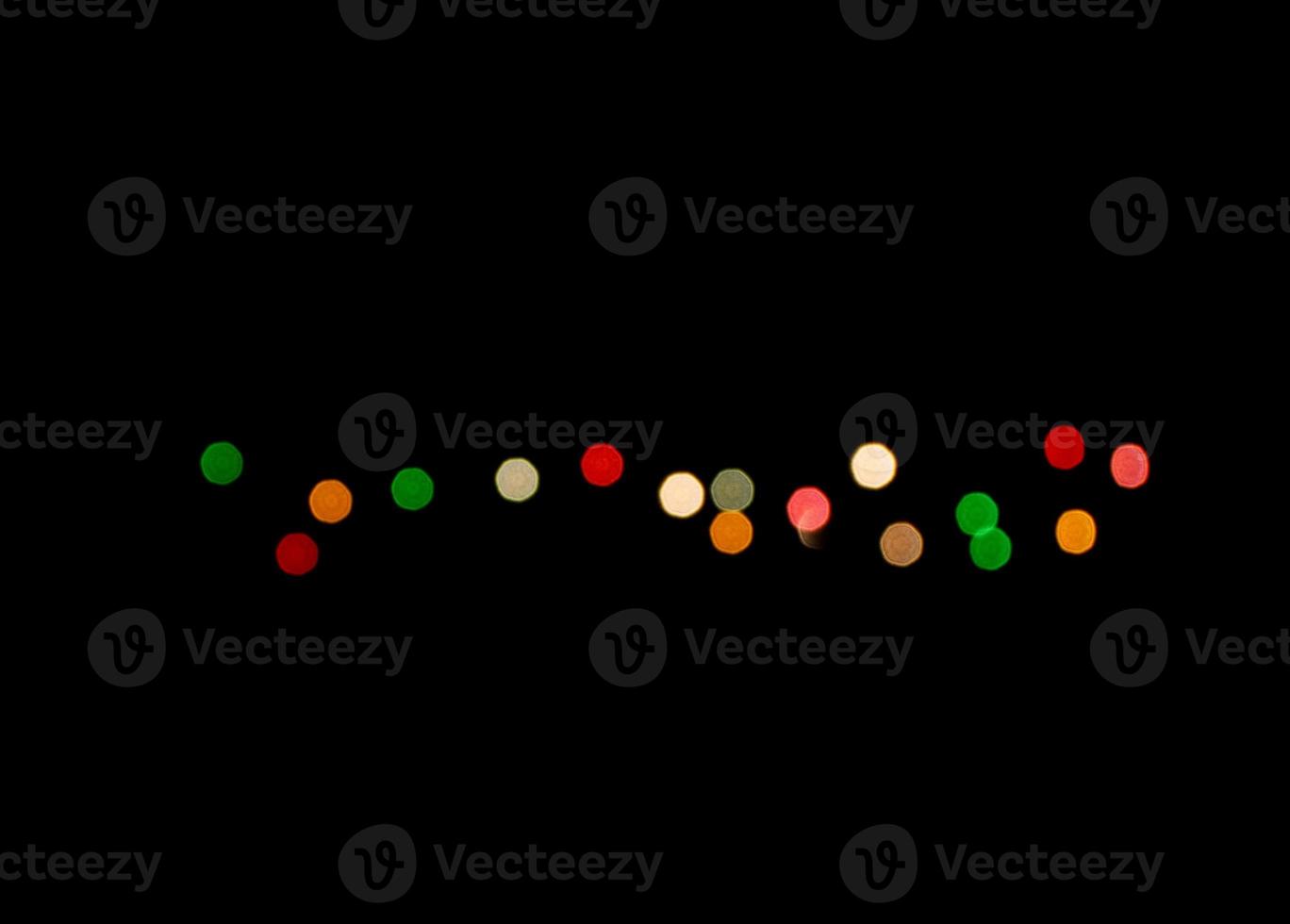Christmas lights over black with copy space photo