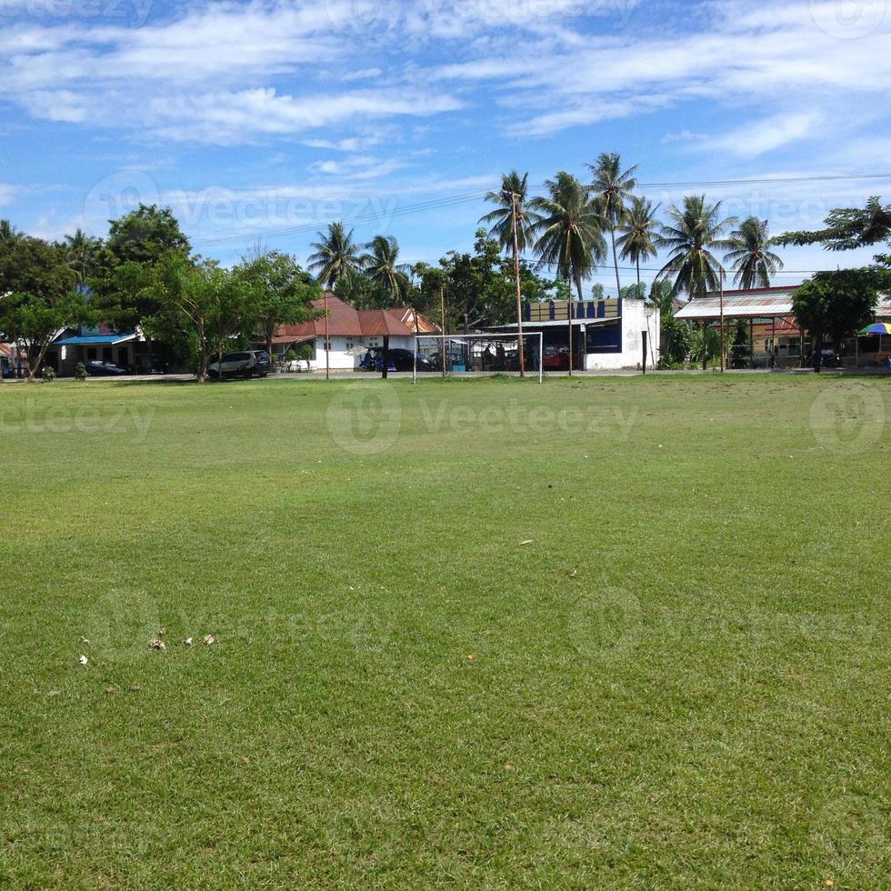 Soccer field with cloudy in the countryside. photo