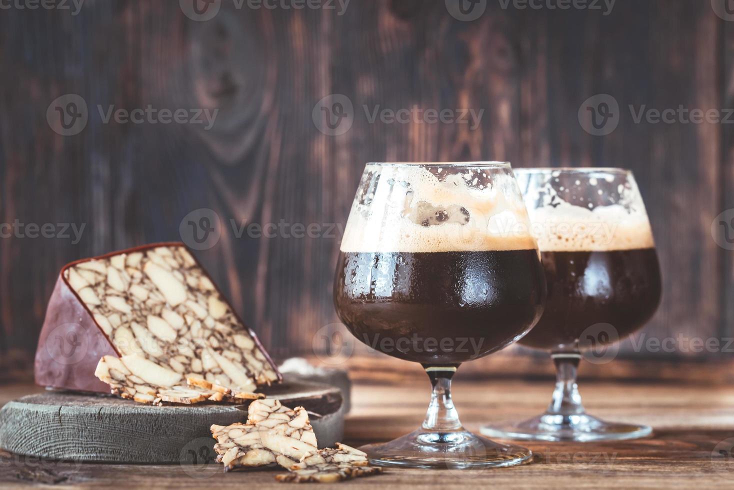 Two glasses of dark beer with Irish Porter Cheddar photo