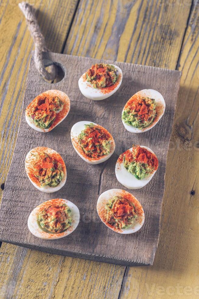Guacamole and bacon deviled eggs 5733520 Stock Photo at Vecteezy