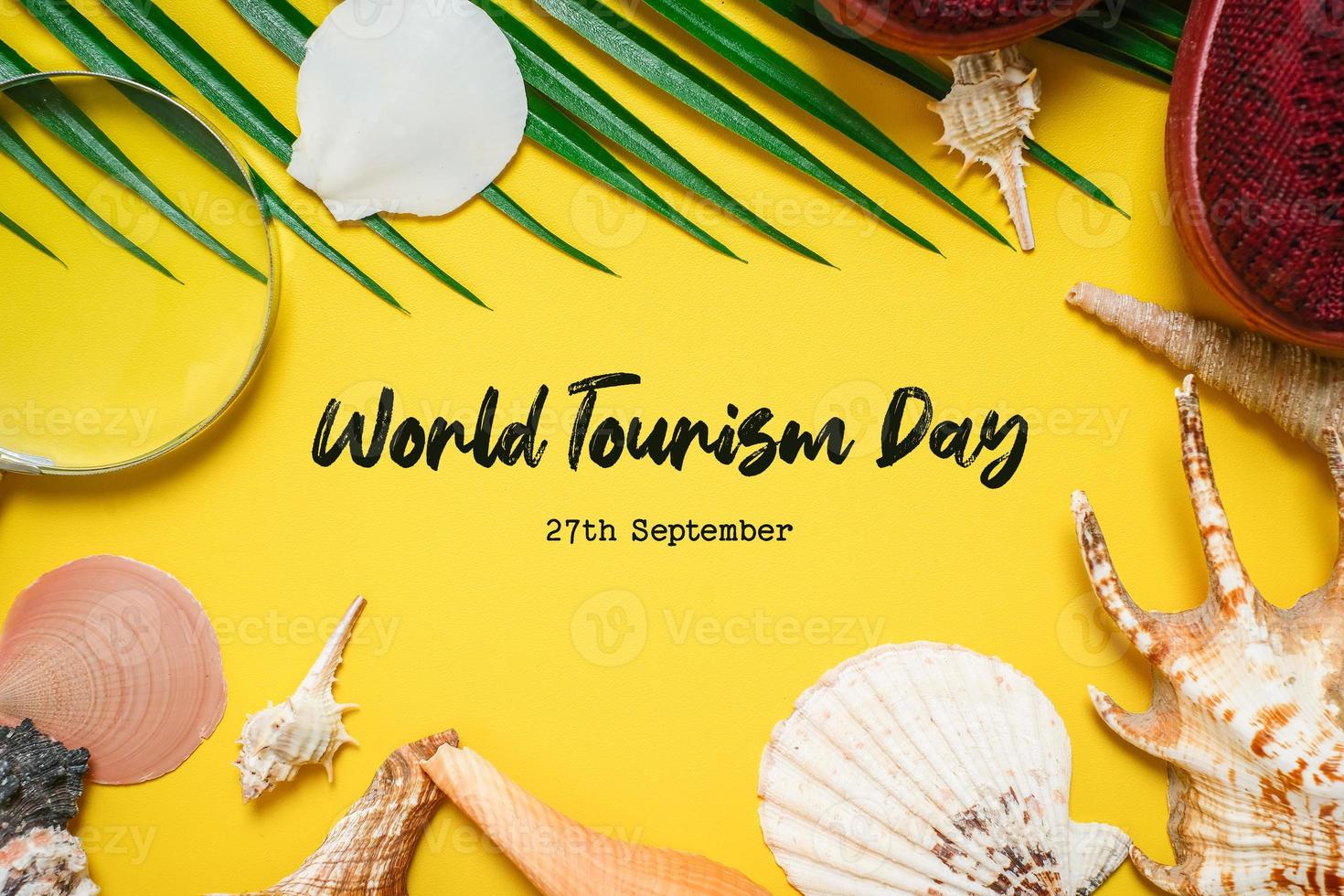 World Tourism Day incription over yellow background photo