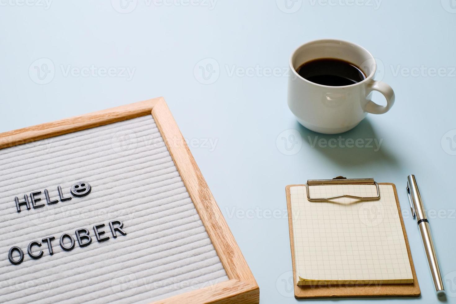 Inscription Hello October on white letter board photo