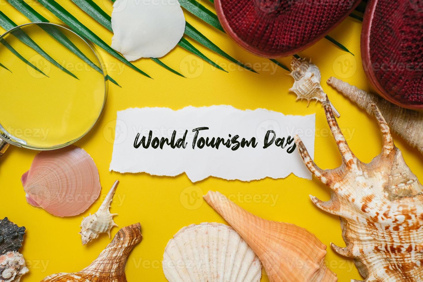 World Tourism Day incription over yellow background photo