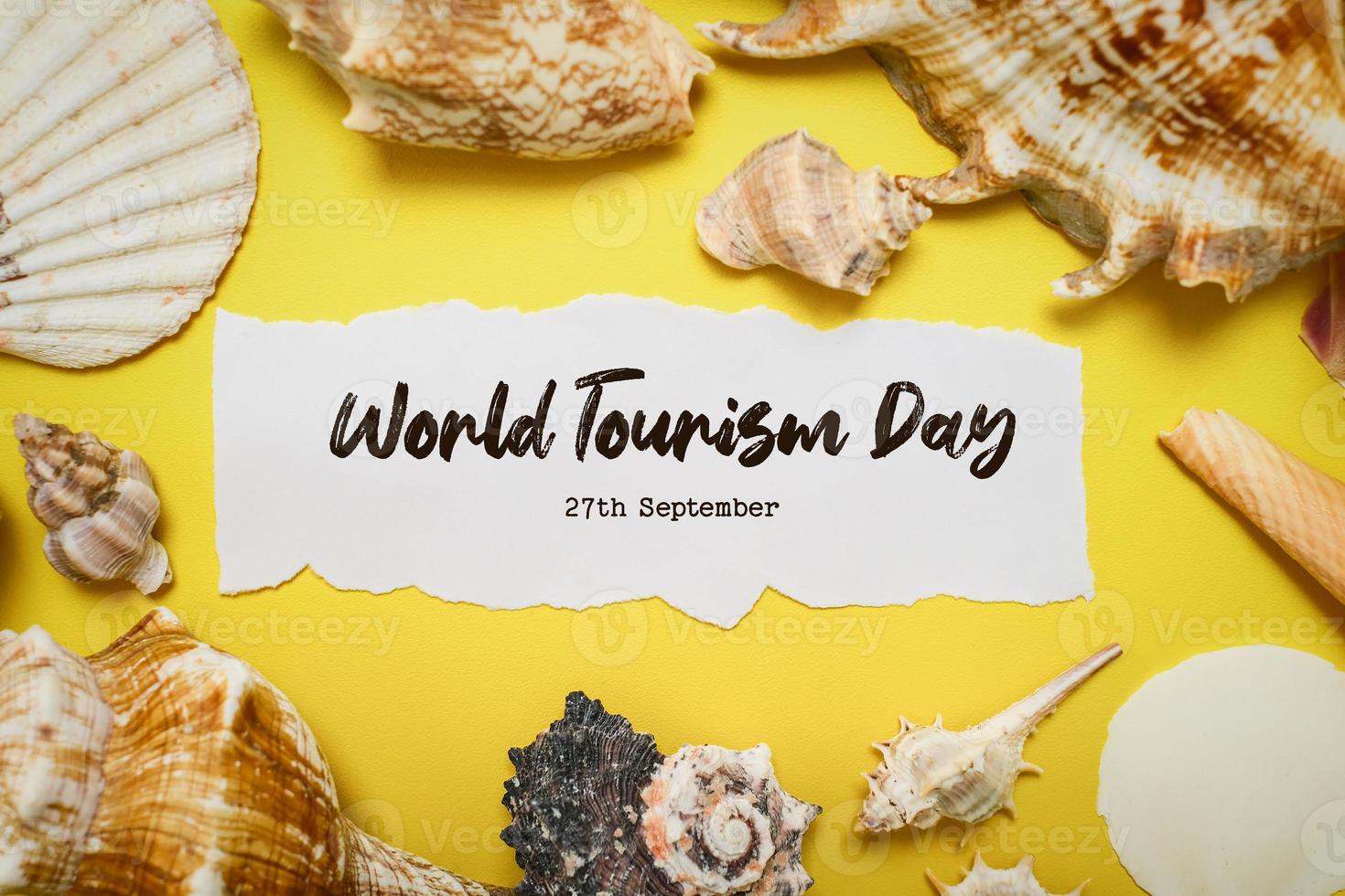 World Tourism Day incription over yellow background photo
