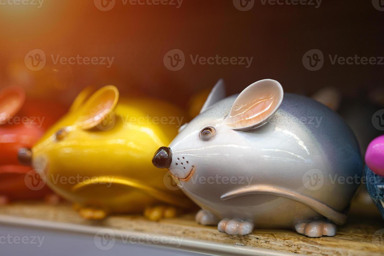 Piggy Bank mouse on the shelf in the store photo
