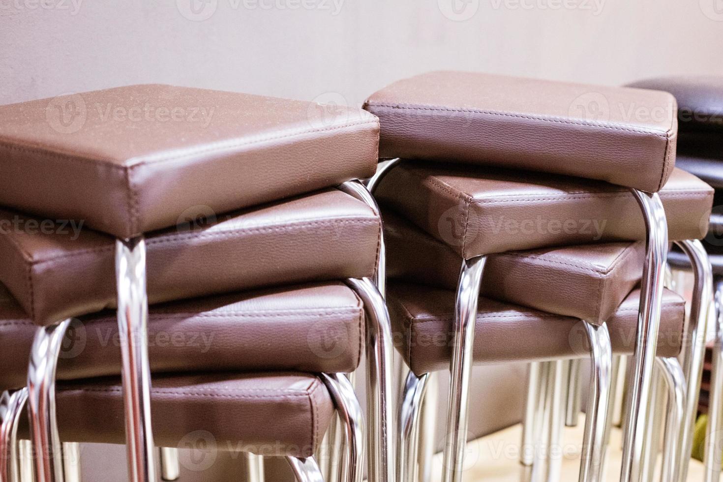 Stools in the store in  stack with metal legs photo