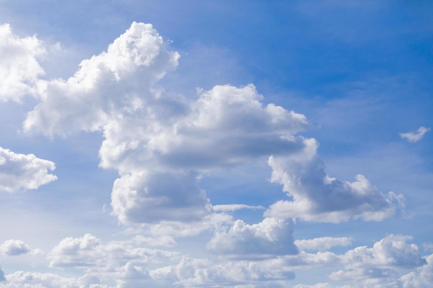 beautiful blue sky background with white clouds photo