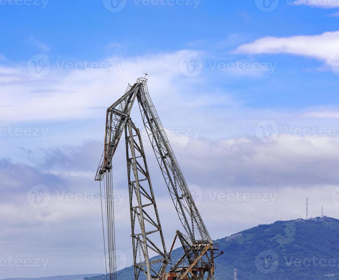 crane on blue sky background photo