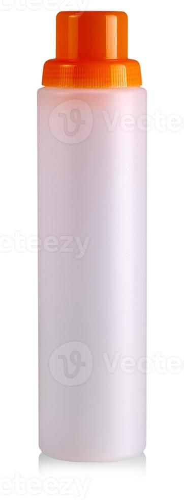 The white plastic bottle with a red cover on white background photo