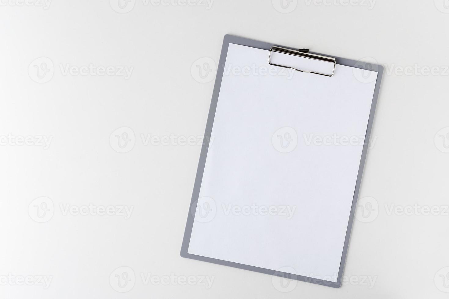 clipboard with a blank sheet of paper photo