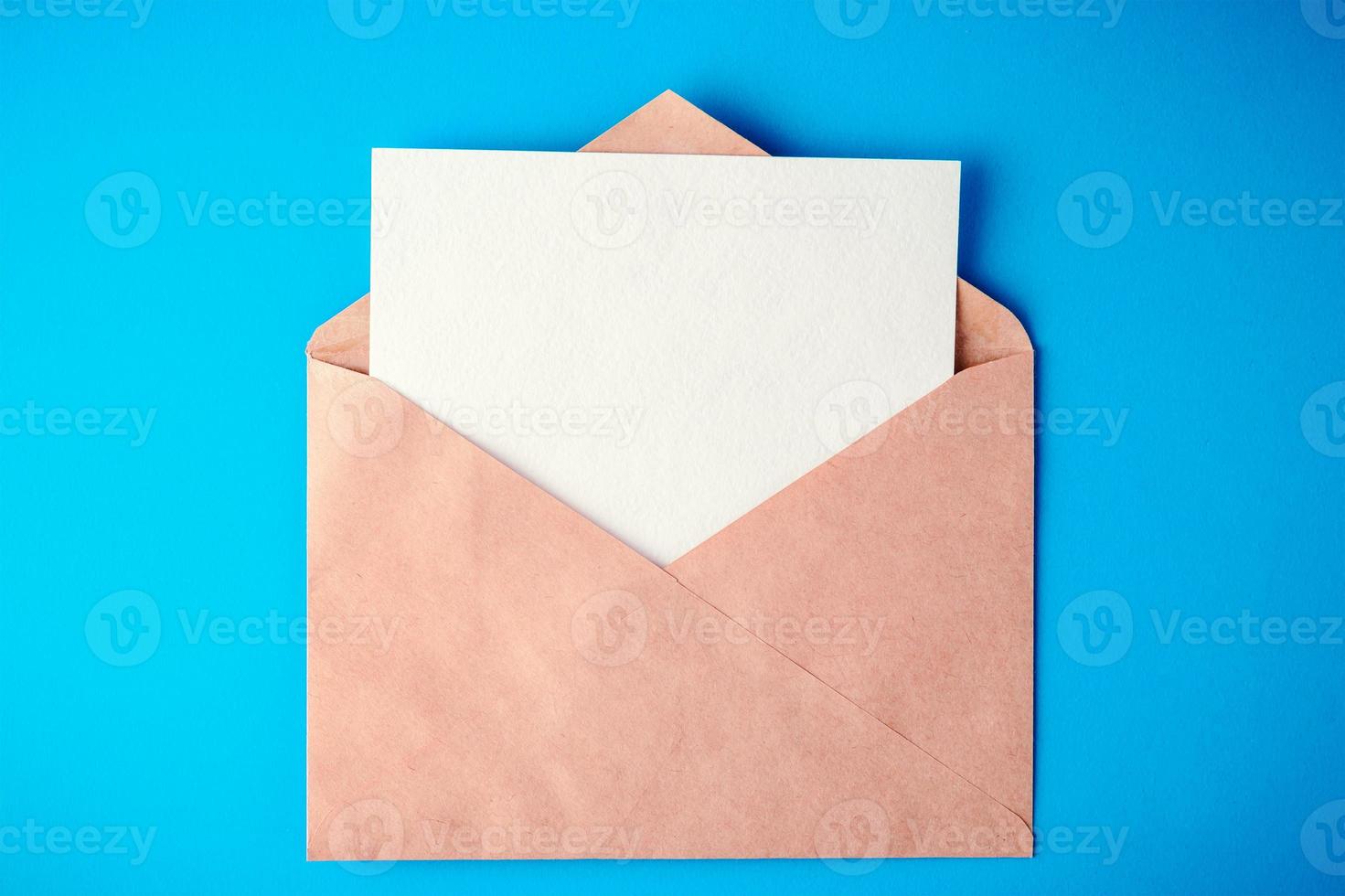 envelope on blue background with shadows photo