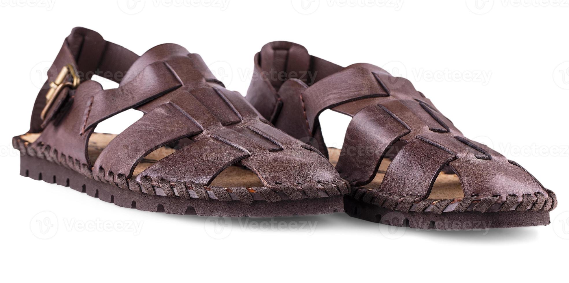 The leather brown men's sandals on white photo