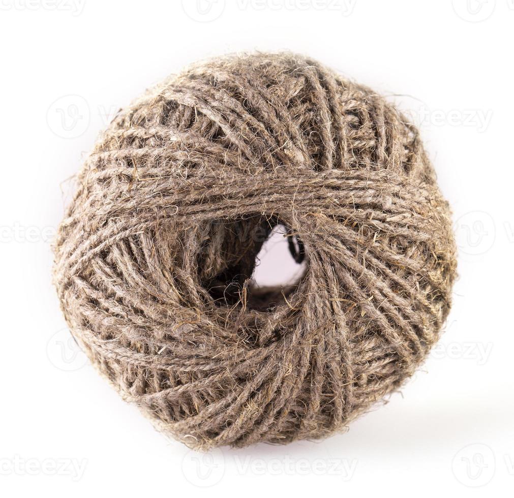 The skein of jute twine isolated on the white background photo