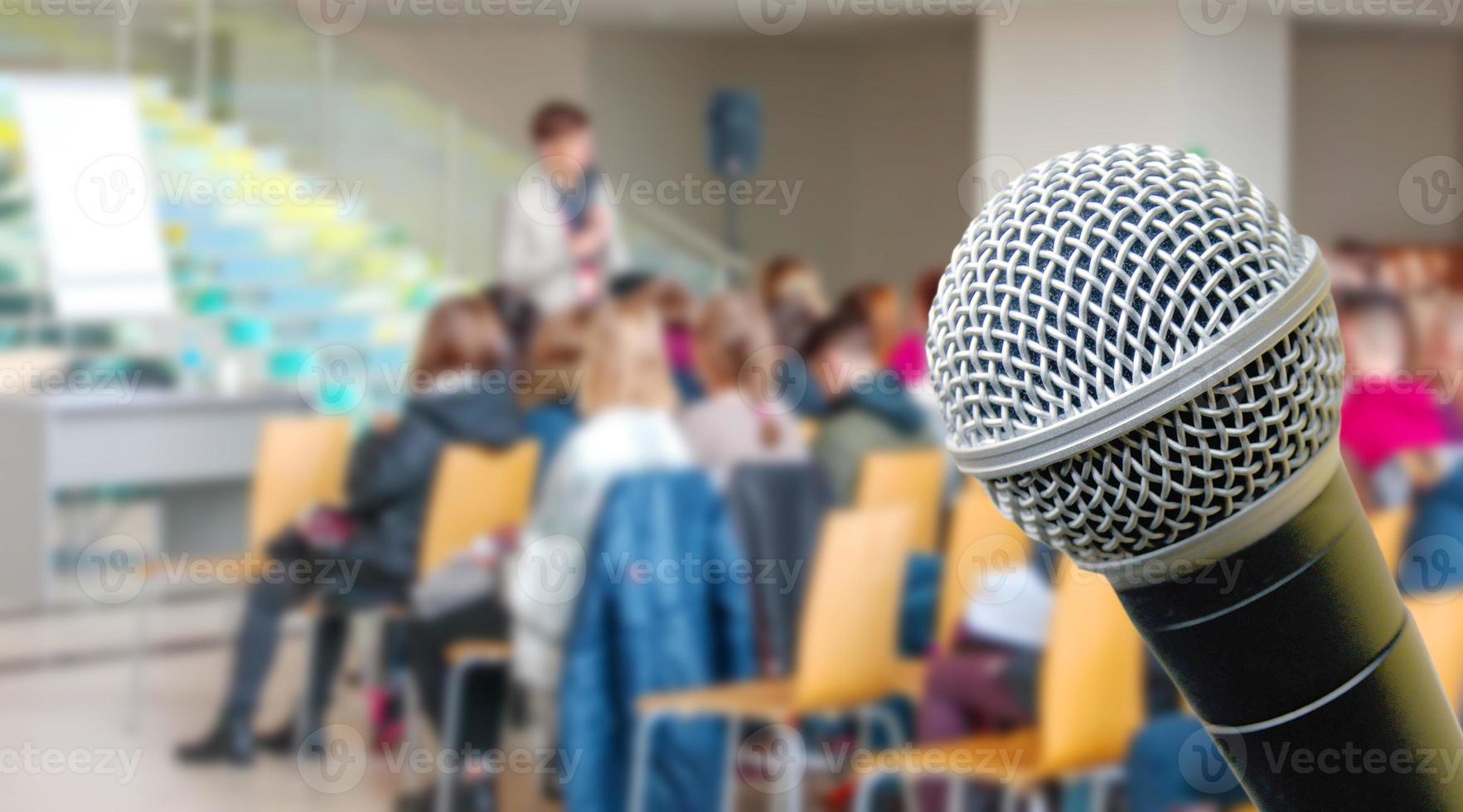 The Top view of meeting room blur background and microphone photo